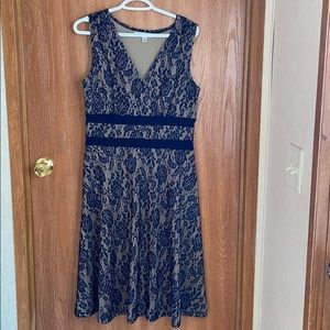 dark blue mesh with tan inside